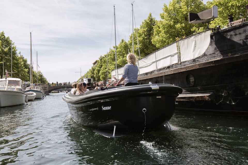Balade en bateau dans le port de Copenhague avec un capitaine Balade en bateau dans le port de Copenhague avec un capitaine