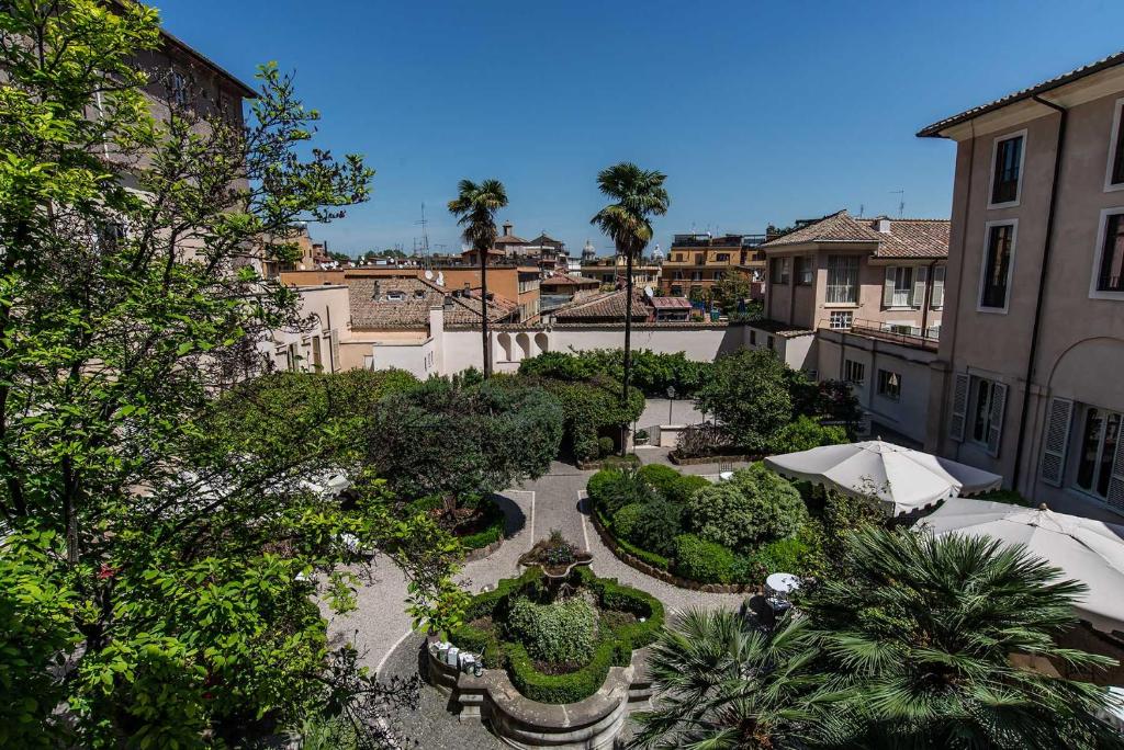Où dormir à Rome ? Les 5 meilleurs quartiers et hôtels (+ ceux à éviter) 🇮🇹 66 Donna Camilla Savelli, Trastevere, Rome